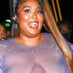 Lizzo wears little more than nipple pasties and a G-string to Cardi B’s birthday